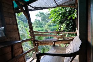 heytheregrace.com | Kampung Lumbung Boutique Hotel, Batu, Malang | kursi santai di depan kamar omah pohon
